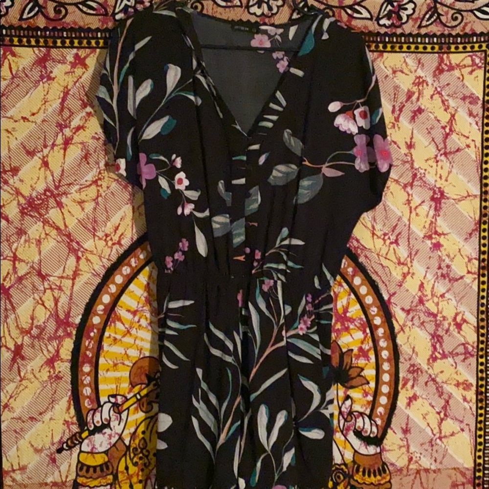 Black with floral design romper